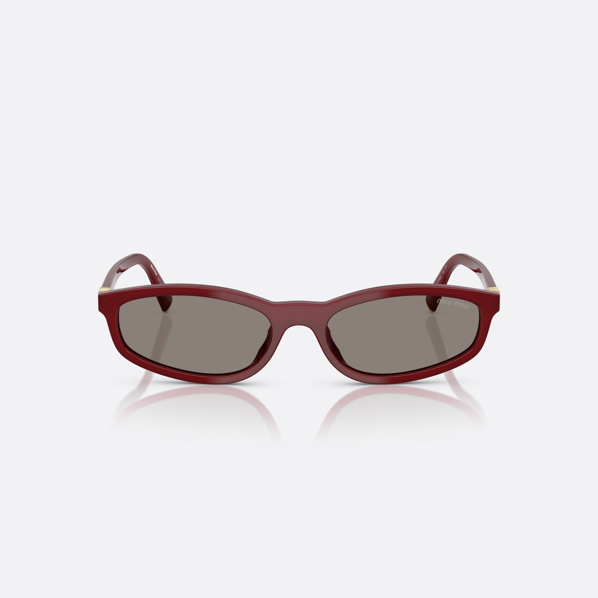 Miu Miu MU A06S 21I80Q sunglasses, red irregular frame for women, plain integrated bridge, brand lettering on temples, front view