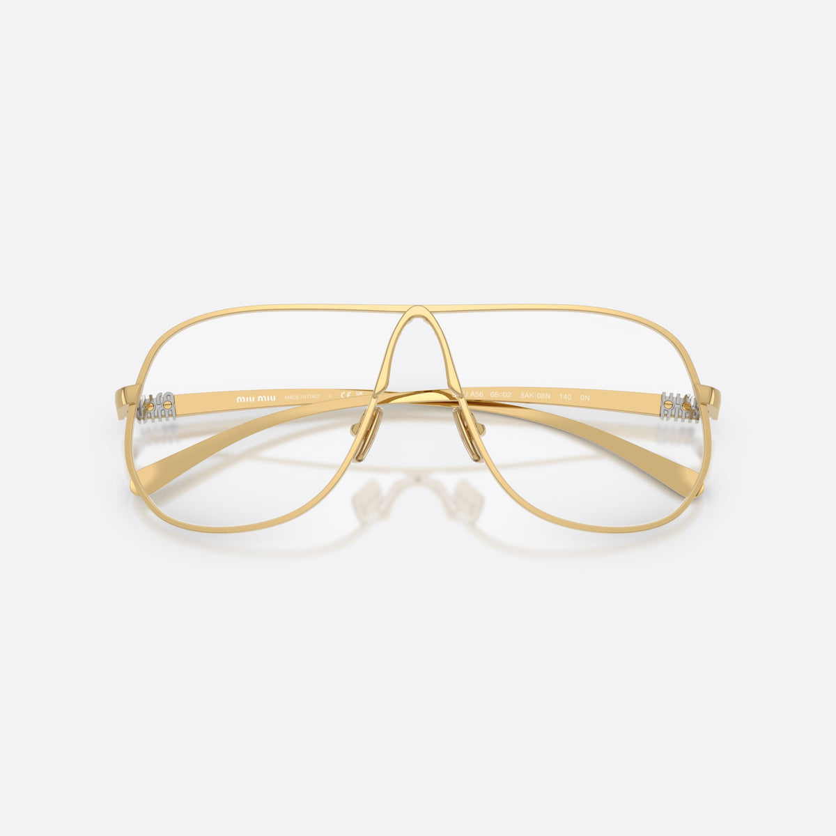 Miu Miu MU A56S 5AK08N sunglasses, gold pilot frame for women, keyhole bridge, brand lettering on temples, full-rim frame, folded