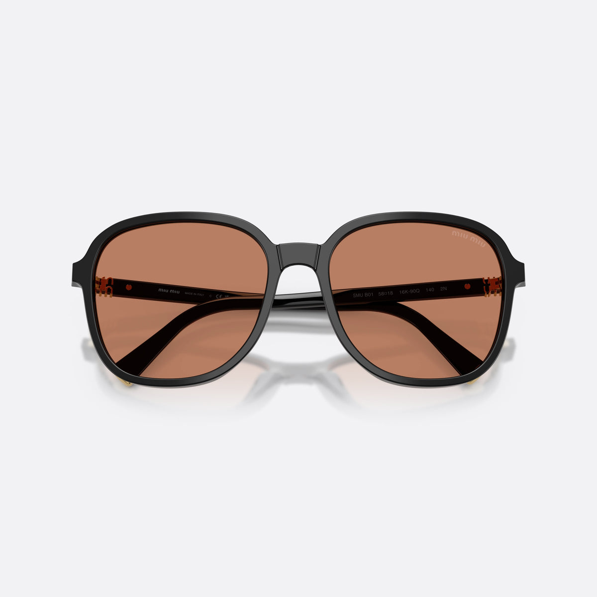 Miu Miu MU B01S 16K90Q sunglasses, black pillow frame for women, plain double bridge, brand lettering on temples, folded