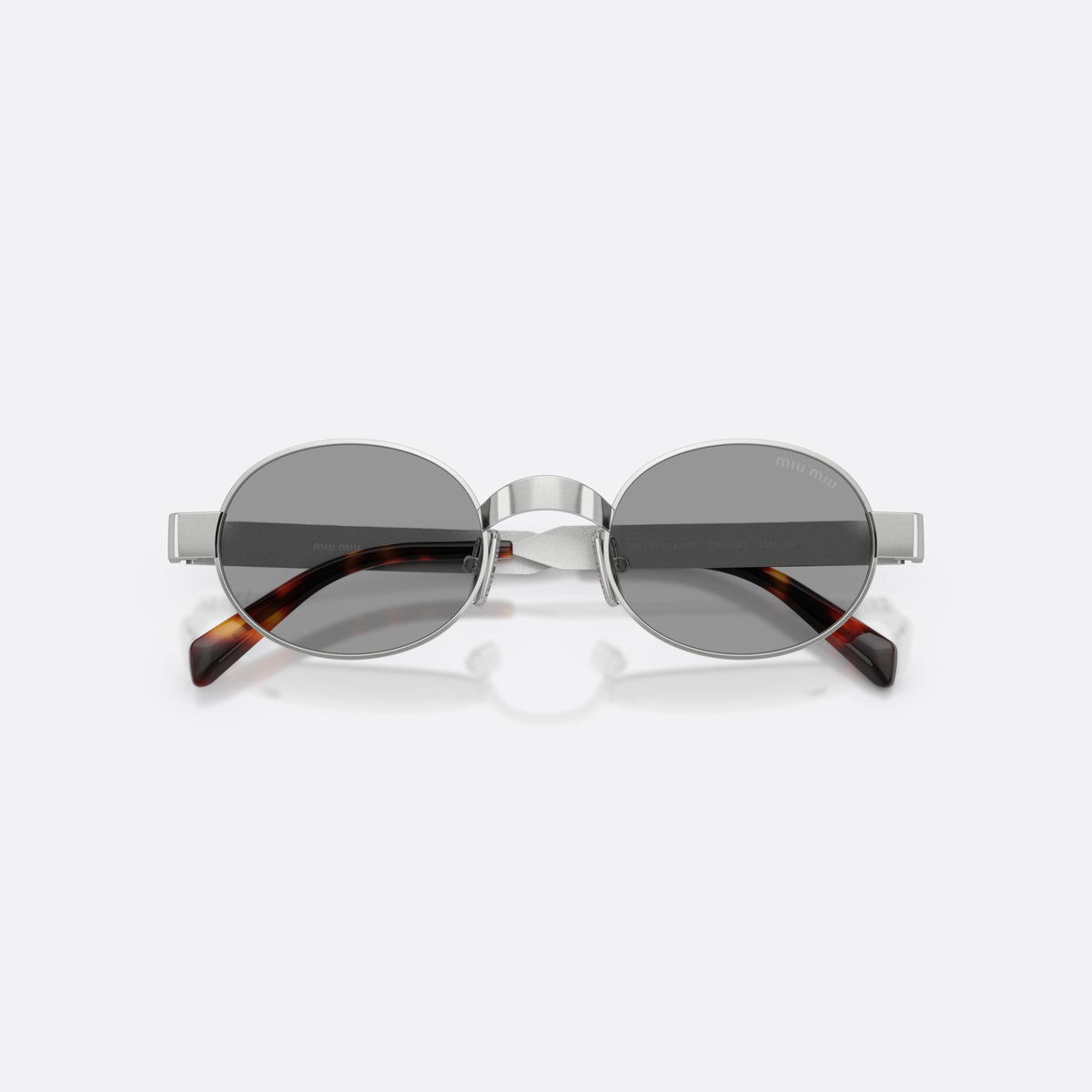 Miu Miu MU B51S 21M50Q sunglasses, silver oval frame for women, plain metal bridge, brand lettering on temples, folded