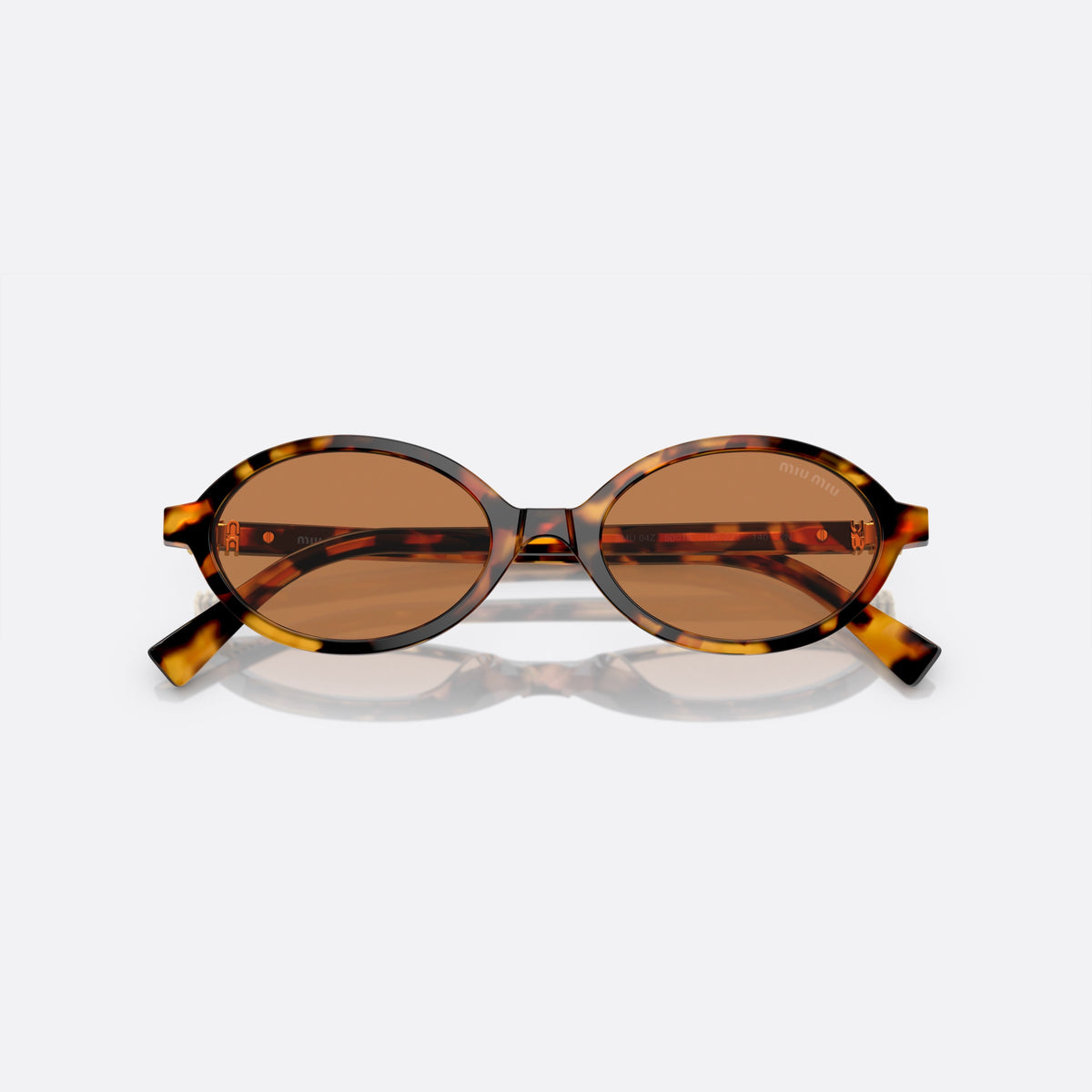 Ochelari de soare Miu Miu SMU 04ZS 19P2Z1, ovali havana, pentru femei, punte integrată simplă, literele brandului pe brațe, cu brațele pliate