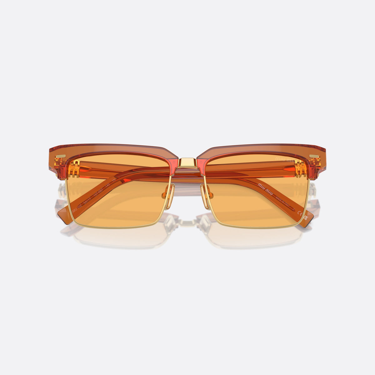 Miu Miu MU 10ZS 15T-0B7 sunglasses, brown squared frame for women, metal bridge with gold-tone center, brand logo on temples, folded