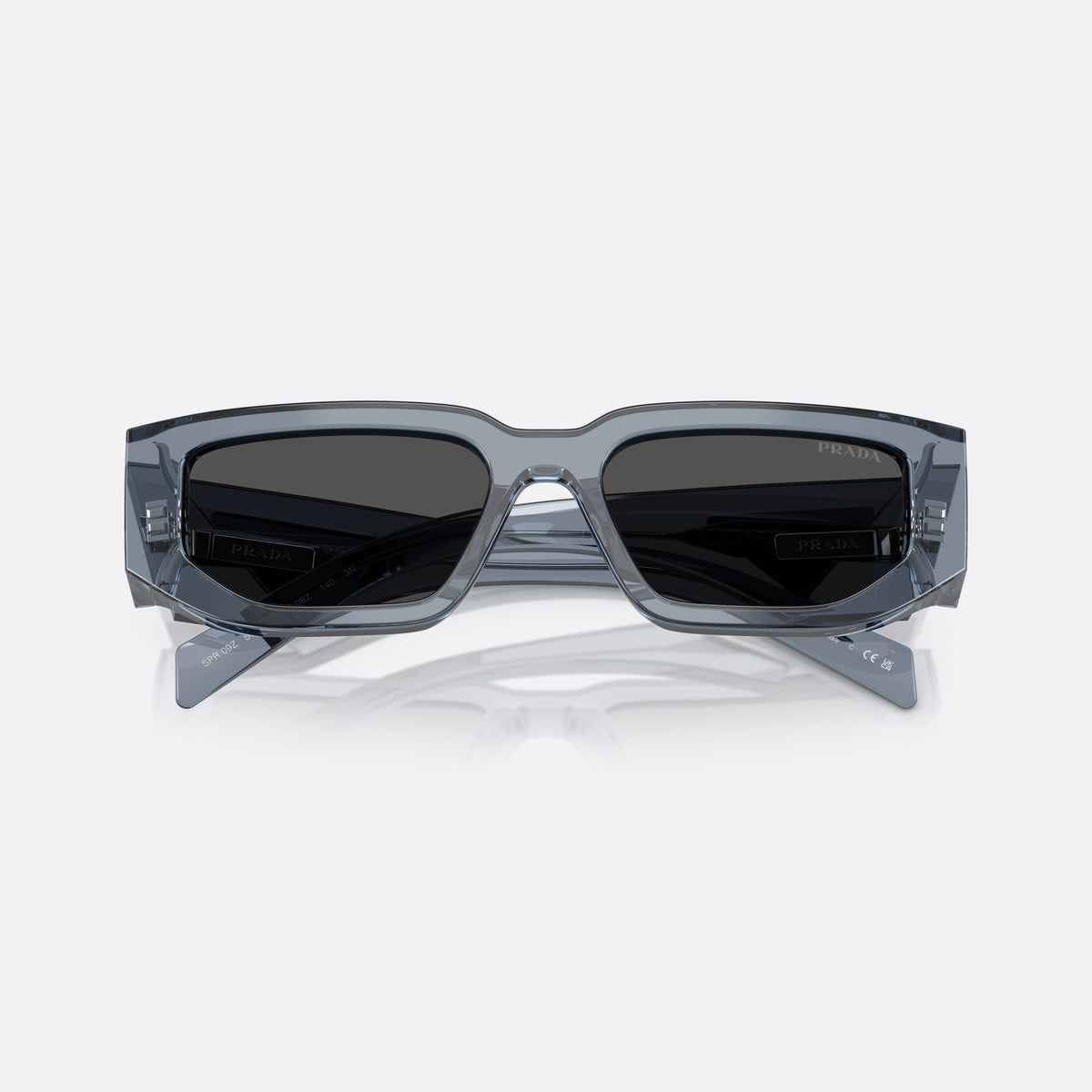 Prada PR 09ZS 17T08Z sunglasses, blue rectangle frame for men, integrated bridge, triangular plaque on temple, folded