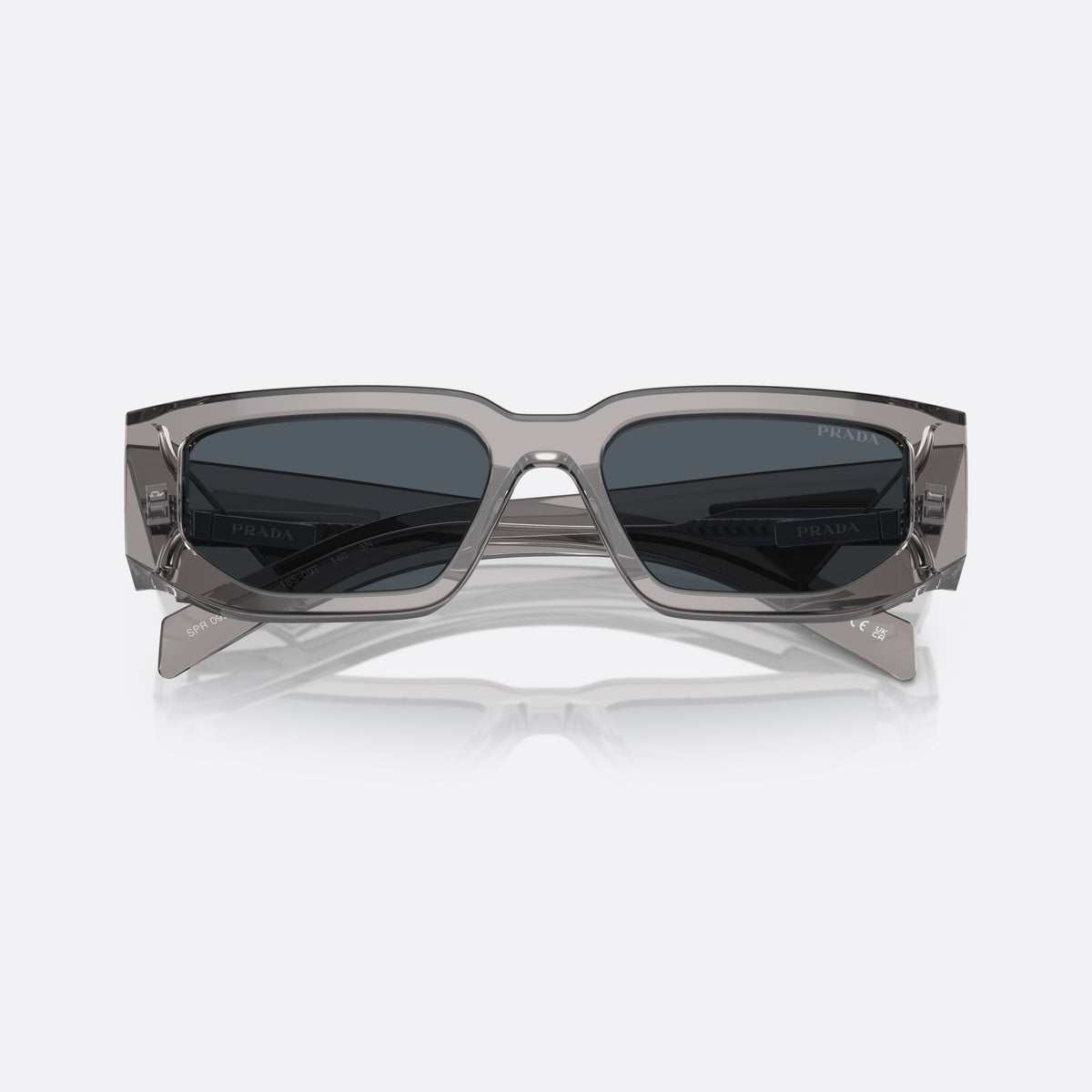 Prada PR 09ZS 18S09T TSDG sunglasses, grey rectangle frame, unisex, keyhole bridge, triangular brand logo plaque, folded