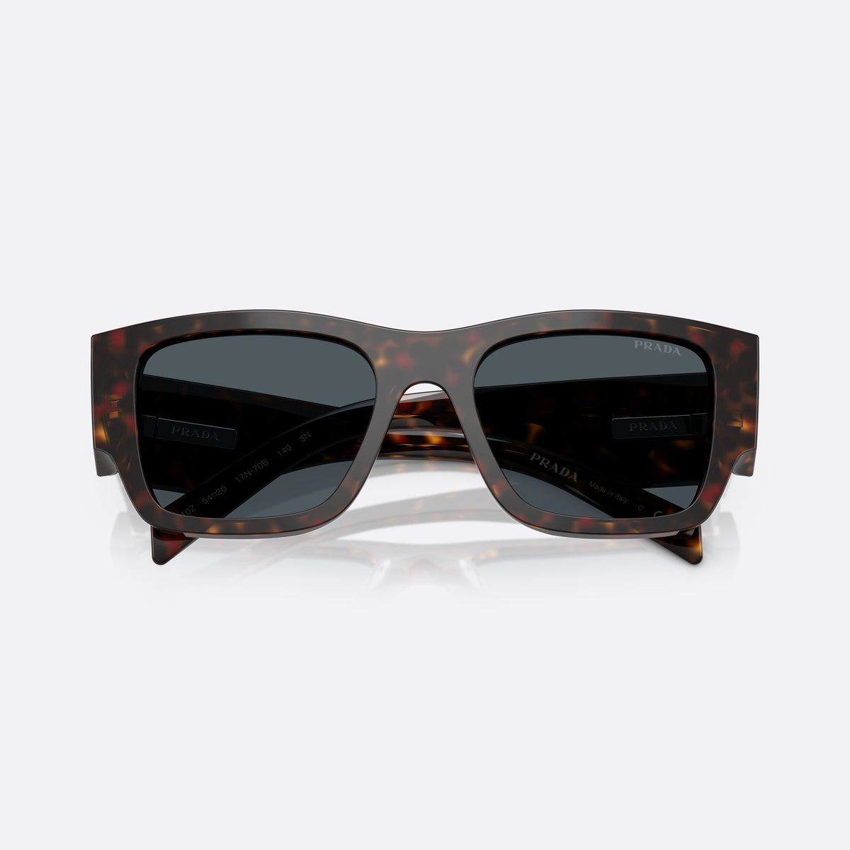 Prada PR 10ZS 17N70B sunglasses, havana pillow frame for men, plain bridge, triangular brand logo plaque, folded