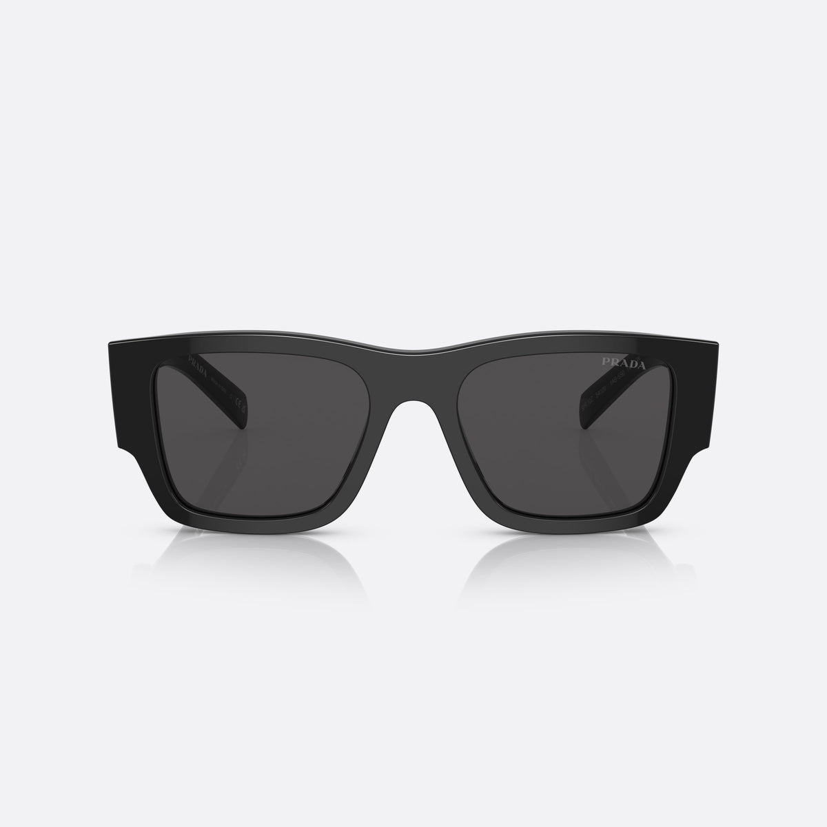 Prada PR 10ZS 1AB-5S0 sunglasses, black pillow frame for men, keyhole bridge, brand logo on temple plaque, front view