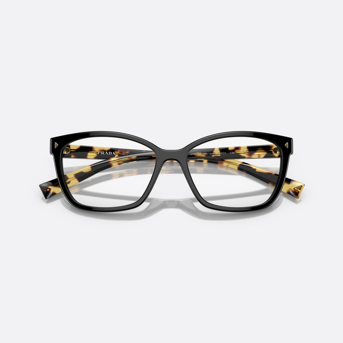 Prada PR 15ZV 389-1O1 eyeglasses, black geometric frame for women, plain double bridge, brand lettering on temples, folded