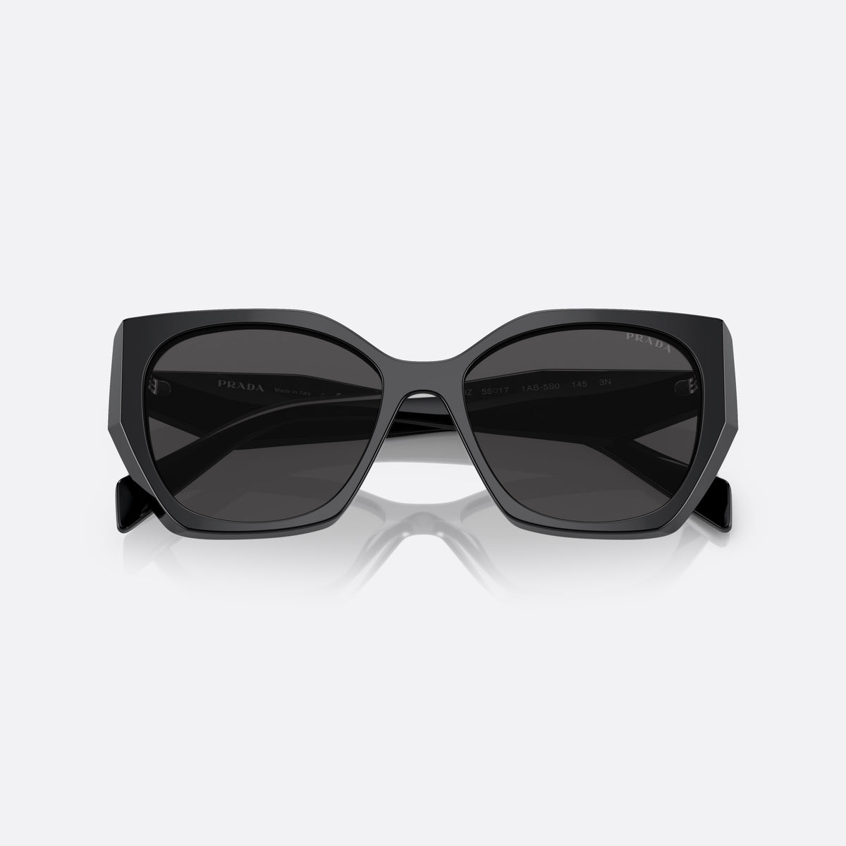 Prada PR 19ZS 1AB5/S0 sunglasses, black pillow frame for women, plain bridge, thick acetate, brand lettering on temples, folded