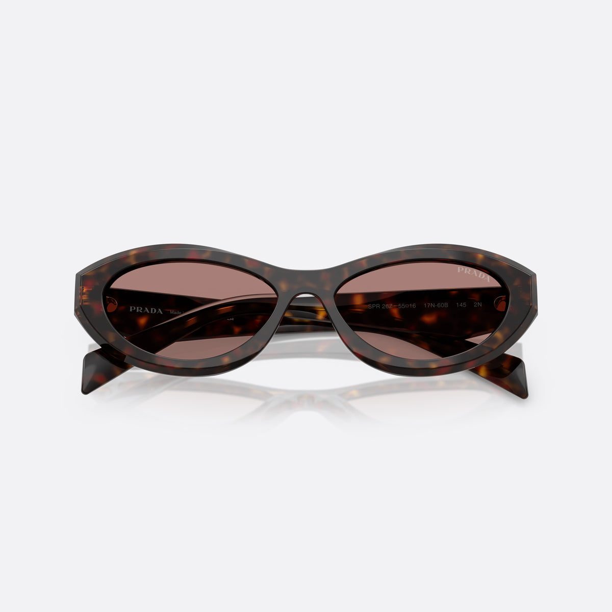 Prada PR 26ZS 17N60B sunglasses, havana irregular frame for women, plain integrated bridge, brand lettering on temples, folded
