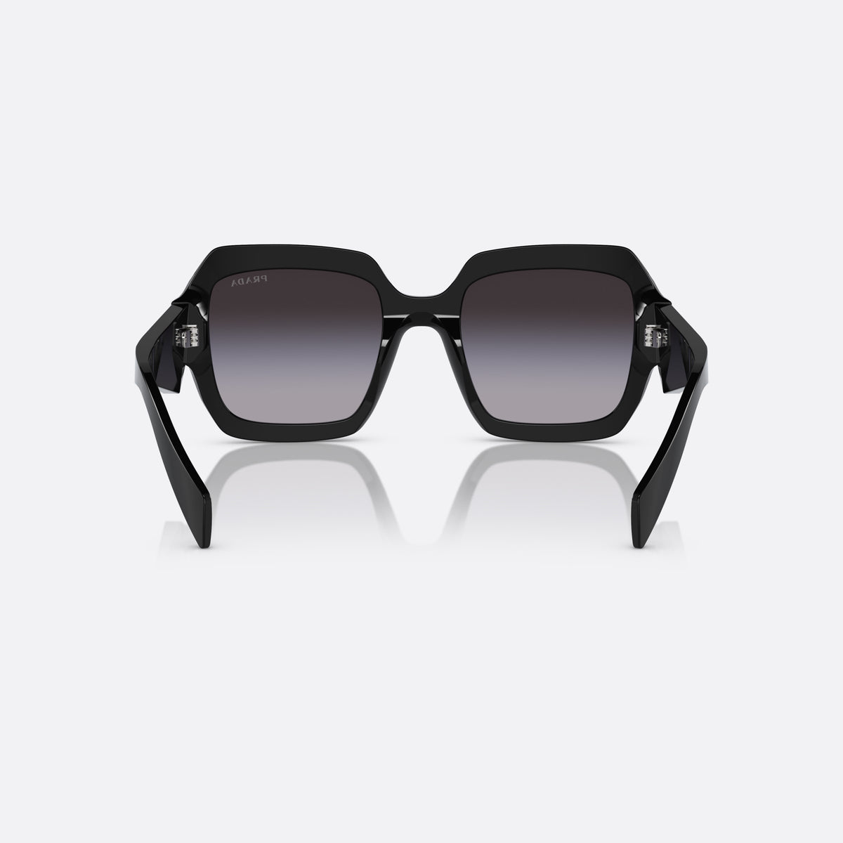 Prada PR 28ZS 16K-90A sunglasses, black pillow frame for women, plain double-arch bridge, brand lettering on the temples, back view