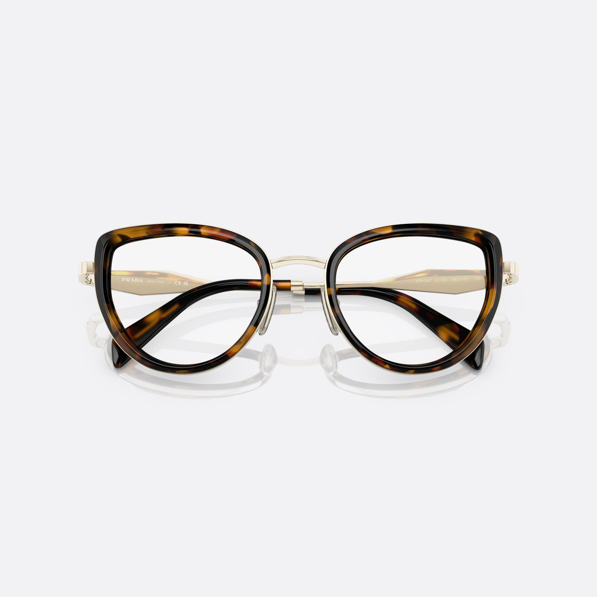 Prada PR 54ZV VAU1O1 eyeglasses, havana pillow frame for women, thin metal double bridge, brand lettering on the temples, folded