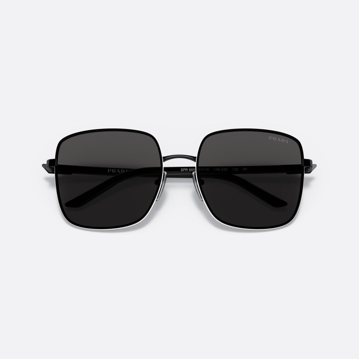 Prada PR 55YS 1AB5S0 sunglasses, black pillow frame for women, thin metal bridge, brand logo plaque on temple, folded