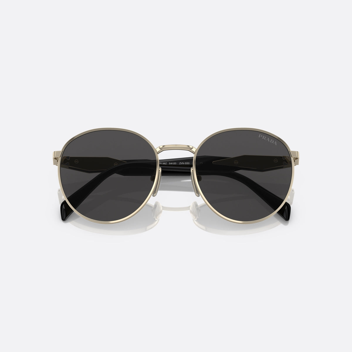 Prada PR 56ZS ZVN-5S0 sunglasses, gold round frame for women, plain metal bridge, brand lettering on temples, folded