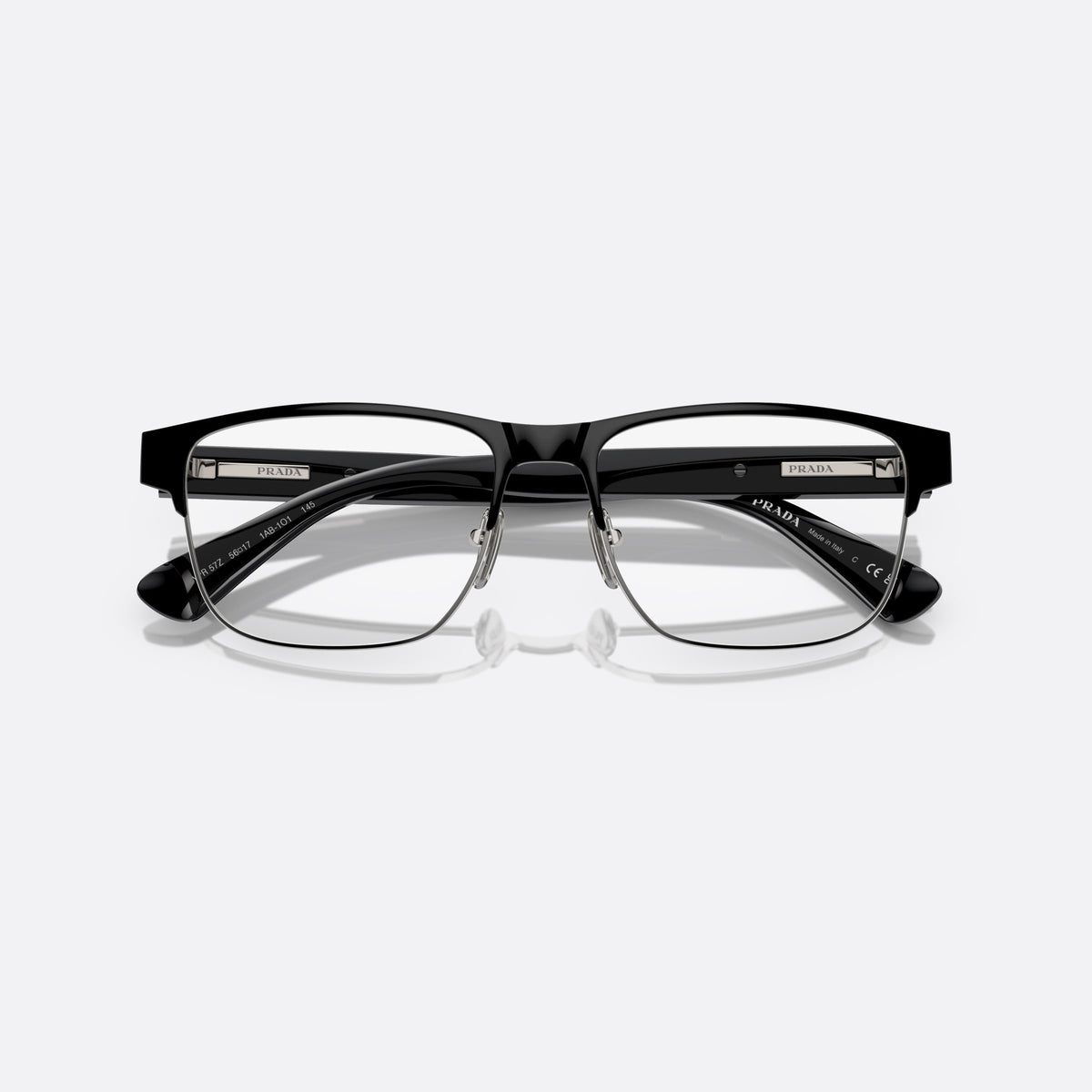 Prada PR 57ZV 1AB-1O1 B eyeglasses, black squared frame for men, plain metal bridge, brand lettering on temples, folded