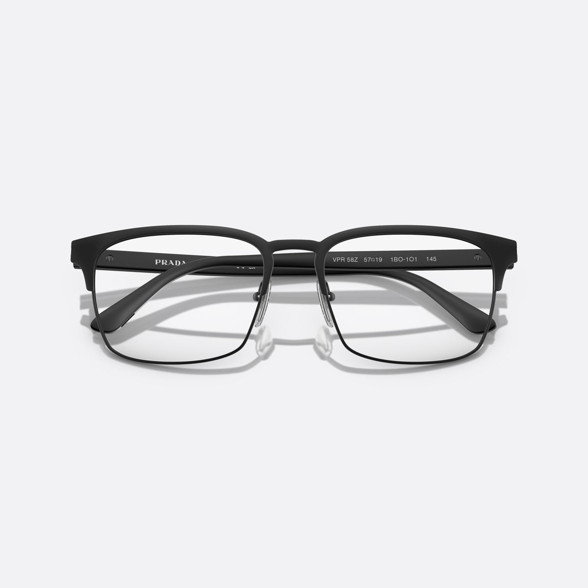 Prada PR 58ZV 1BO-1O1 X eyeglasses, black squared frame for men, brand lettering on temples, flat temples with plaque, folded