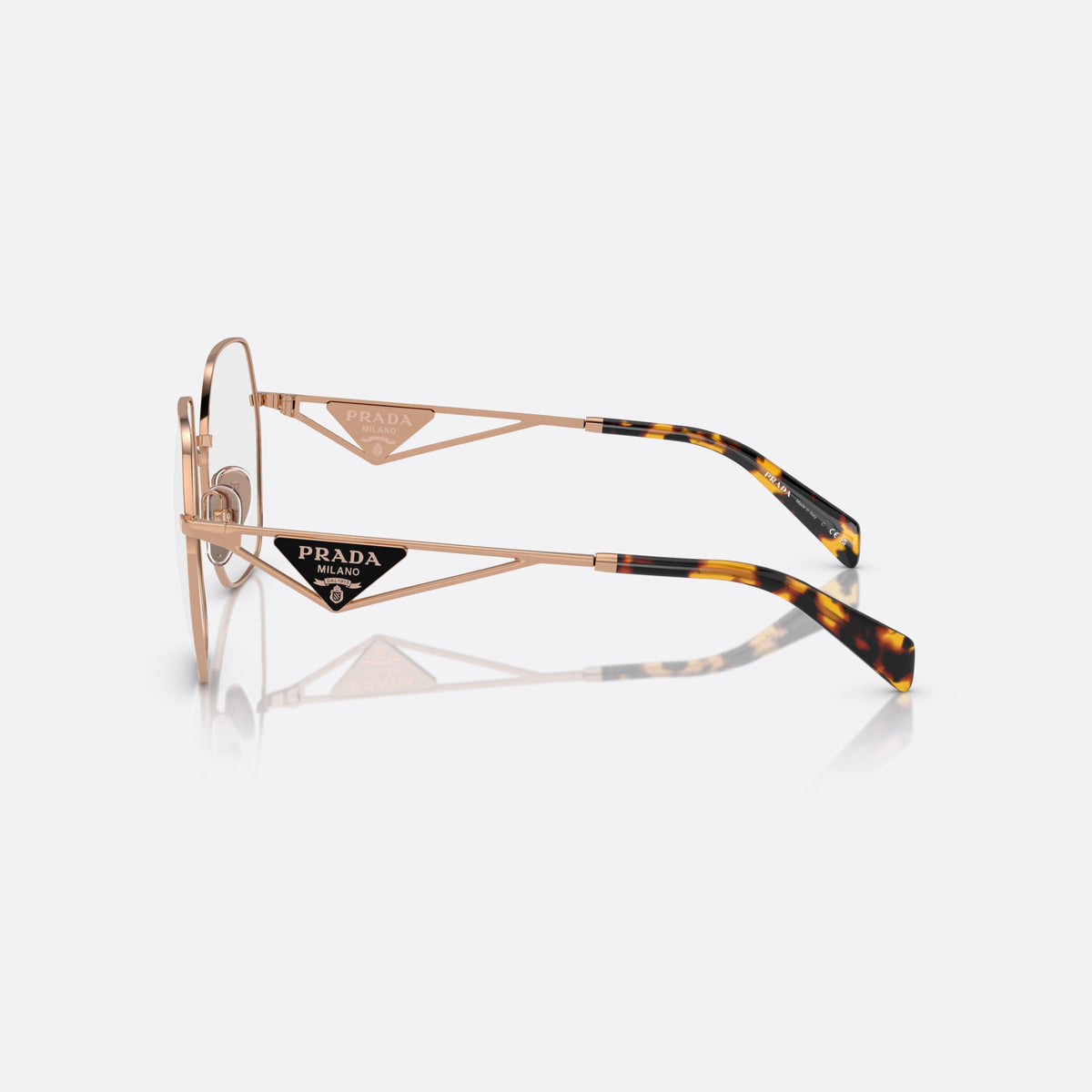 Prada PR 59ZV SVF-1O1 V eyeglasses, gold geometric frame for women, thin metal saddle bridge, brand lettering on plaque, side view