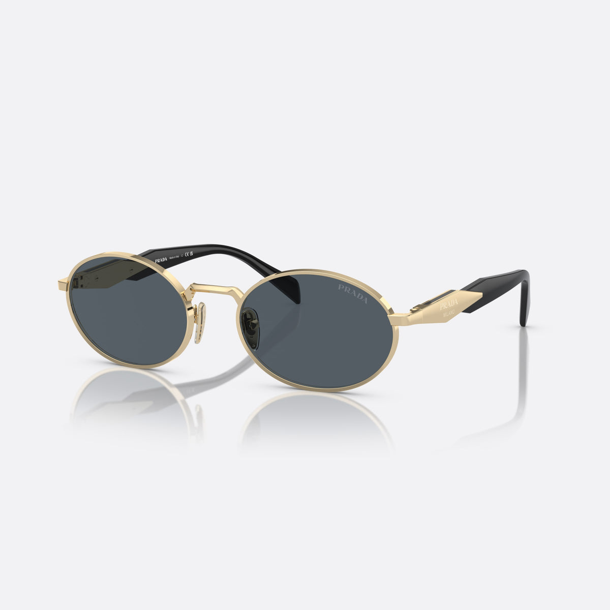 Prada PR 65ZS ZVN-09T sunglasses, gold oval frame for women, plain metal bridge, brand logo plaque on temple