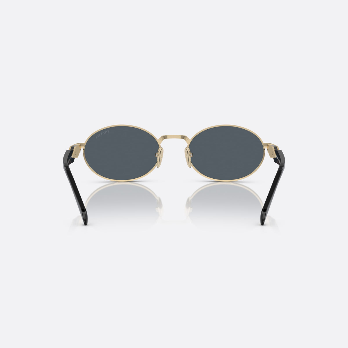 Prada PR 65ZS ZVN-09T sunglasses, gold oval frame for women, plain metal bridge, brand logo plaque on temple