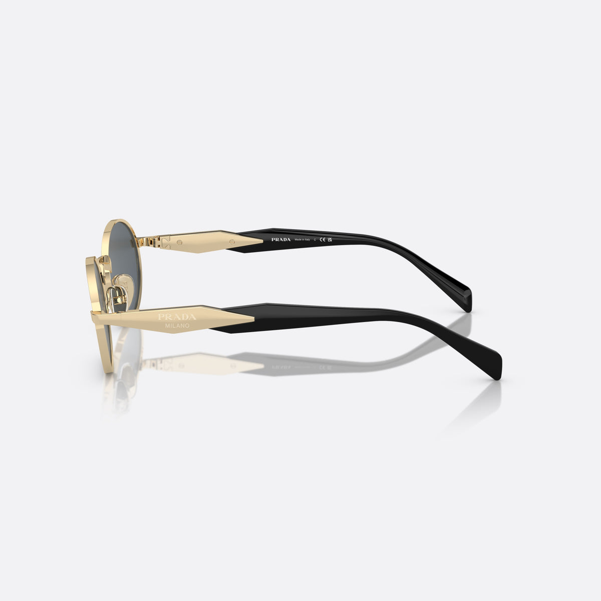 Prada PR 65ZS ZVN-09T sunglasses, gold oval frame for women, plain metal bridge, brand logo plaque on temple