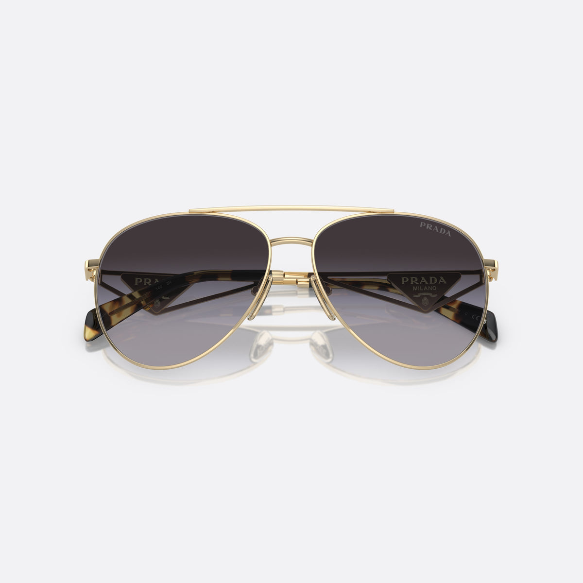Prada PR 73ZS ZVN-5D1 C sunglasses, gold pilot frame for women, double bridge with top bar, brand logo on temples, folded