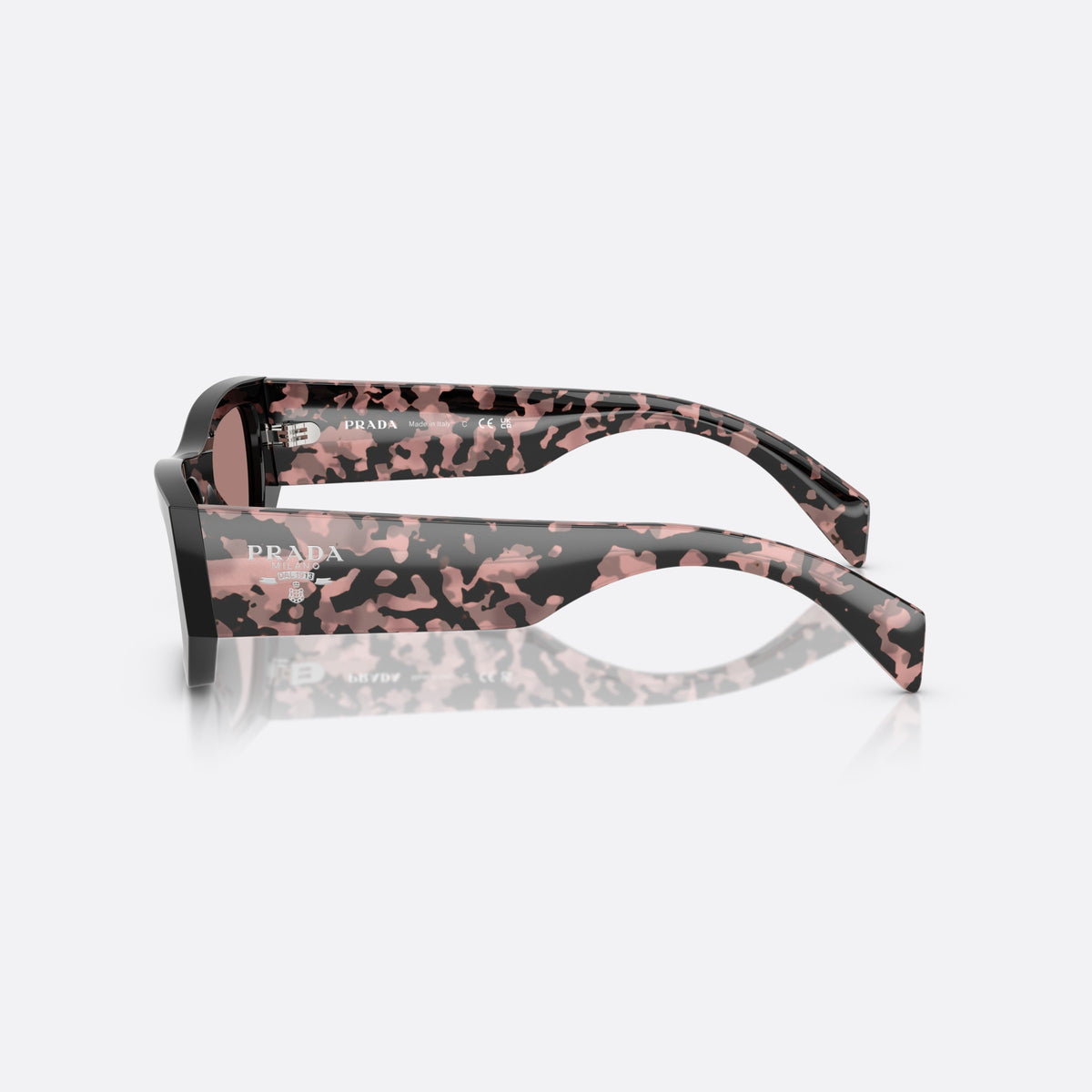 Prada PR A01S 13P60B sunglasses, black pillow frame for women, plain bridge, integrated into frame, wide tapered temples, side view