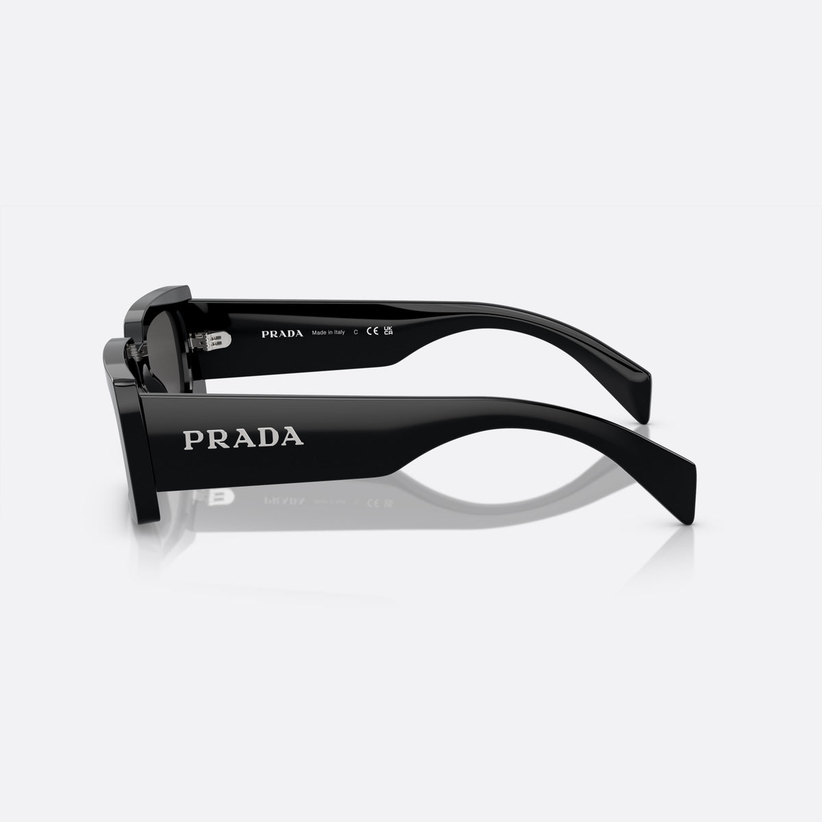 Prada PR A07S 1AB-5S0 N sunglasses, black pillow frame for women, plain bridge, brand lettering on temples, full-rim frame, side view