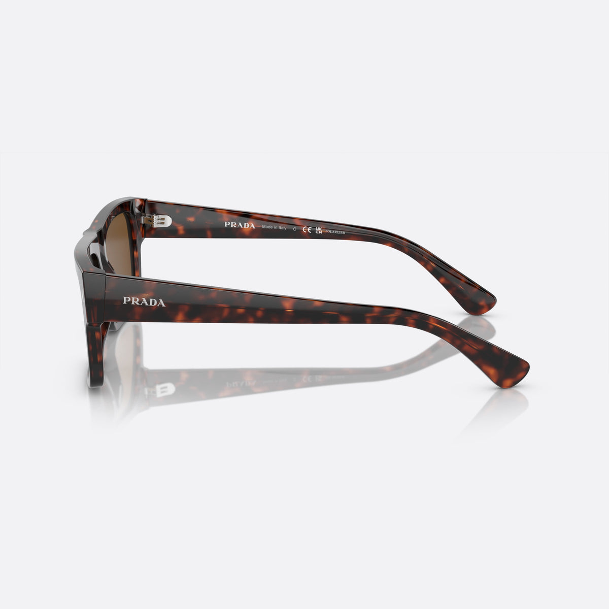 Prada PR A10S 17N01D sunglasses, havana rectangle frame for men, plain bridge, brand lettering on temples, side view