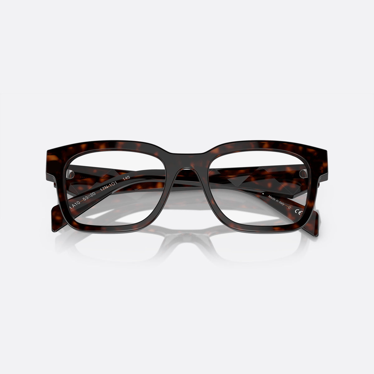 Prada PR A10V 17N-1O1 M eyeglasses, havana squared frame for men, plain acetate bridge, brand lettering on temples, folded