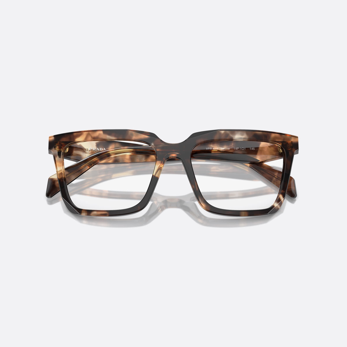 Prada PR A19V 14P1O1 eyeglasses, havana squared frame for women, plain bridge with dip, brand lettering on temples, folded