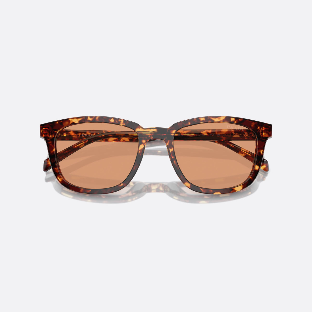 Prada PR A21S 14O-07V sunglasses, havana geometric frame for men, saddle bridge, brand lettering on temples, folded
