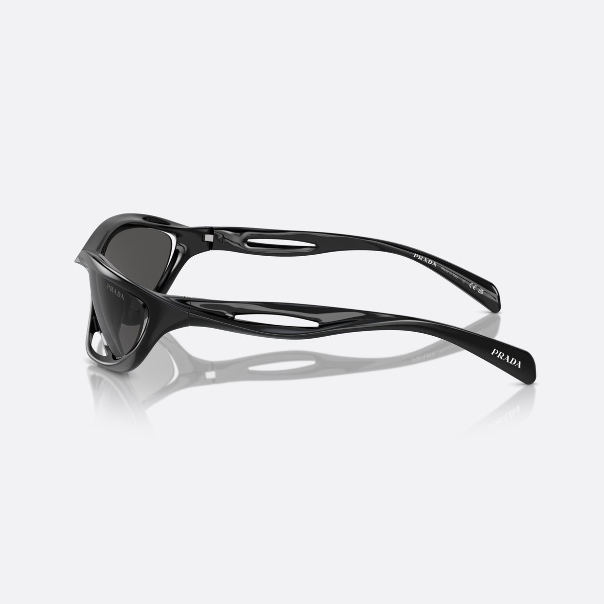 Prada PR A23S 1AB5S0 sunglasses, black cat eye frame for women, double bridge with open cutouts, full-rim frame, side view