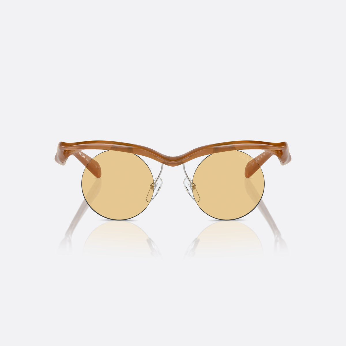 Prada PR A24S 13S80E sunglasses, brown round frame for women, brand lettering on the temples, solid tinted lenses, front view