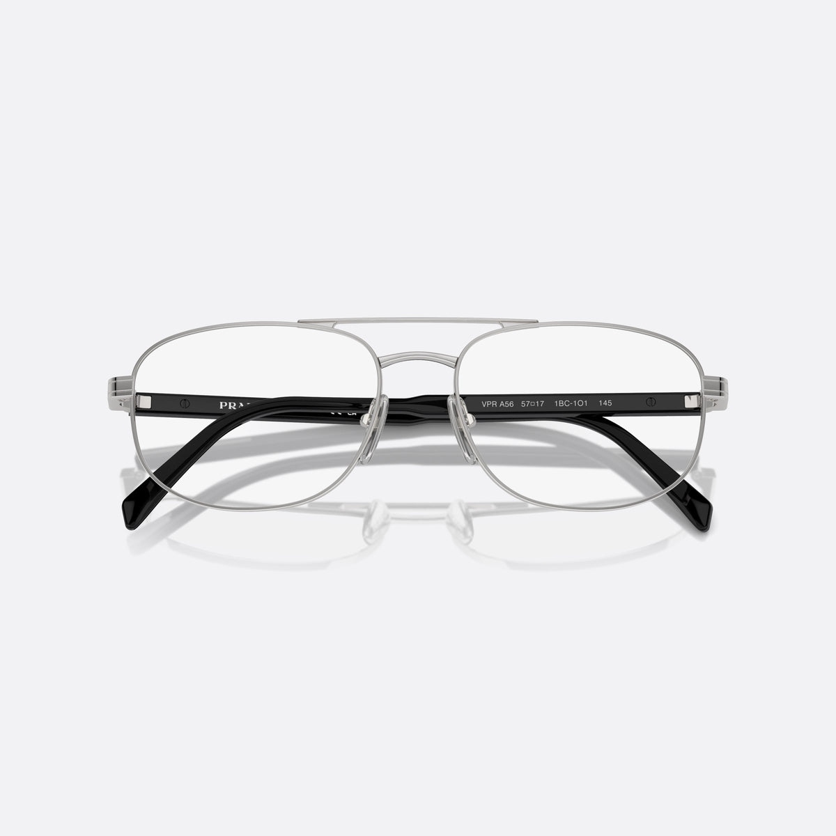 Prada PR A56V 1BC1O1 eyeglasses, silver round frame for men, double bridge with top bar, brand lettering on the temples, folded