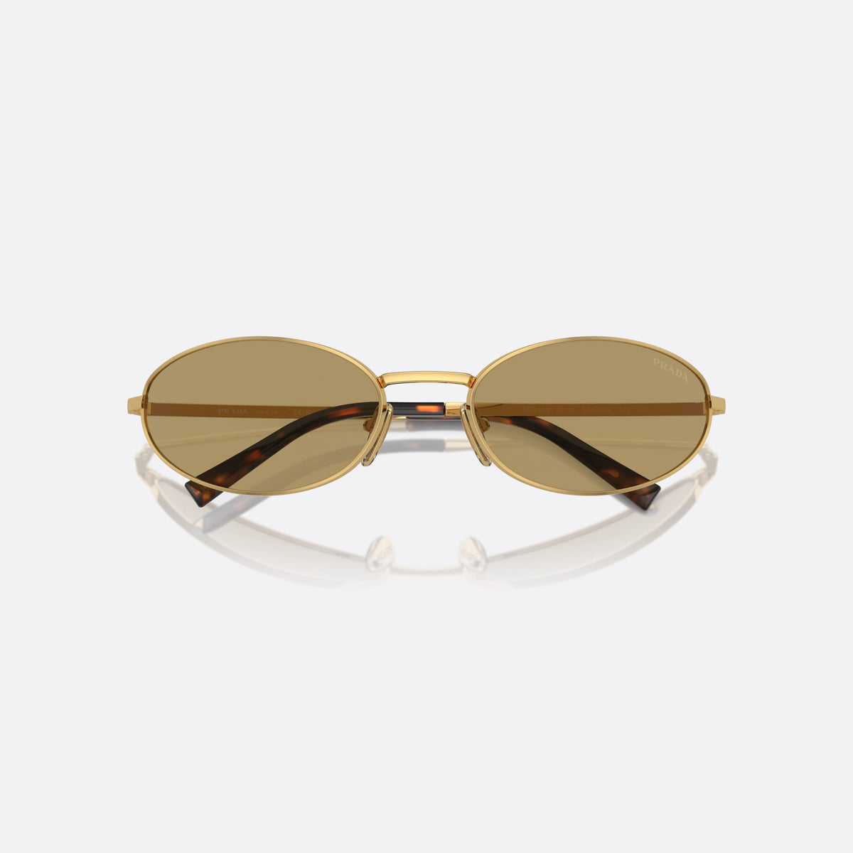 Prada PR A59S 5AK70G sunglasses, gold oval frame for women, plain metal bridge, brand lettering on temples, folded