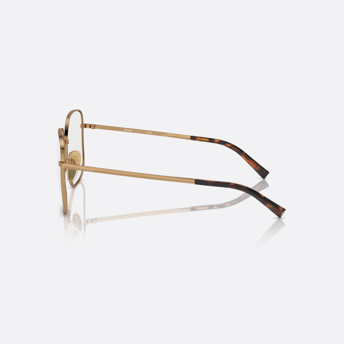 Rame ochelari de vedere Prada PR A59V 7OE1O1, geometrica maro, pentru femei, punte tip șa cu bară metalică, literele brandului pe brațe, vedere laterală