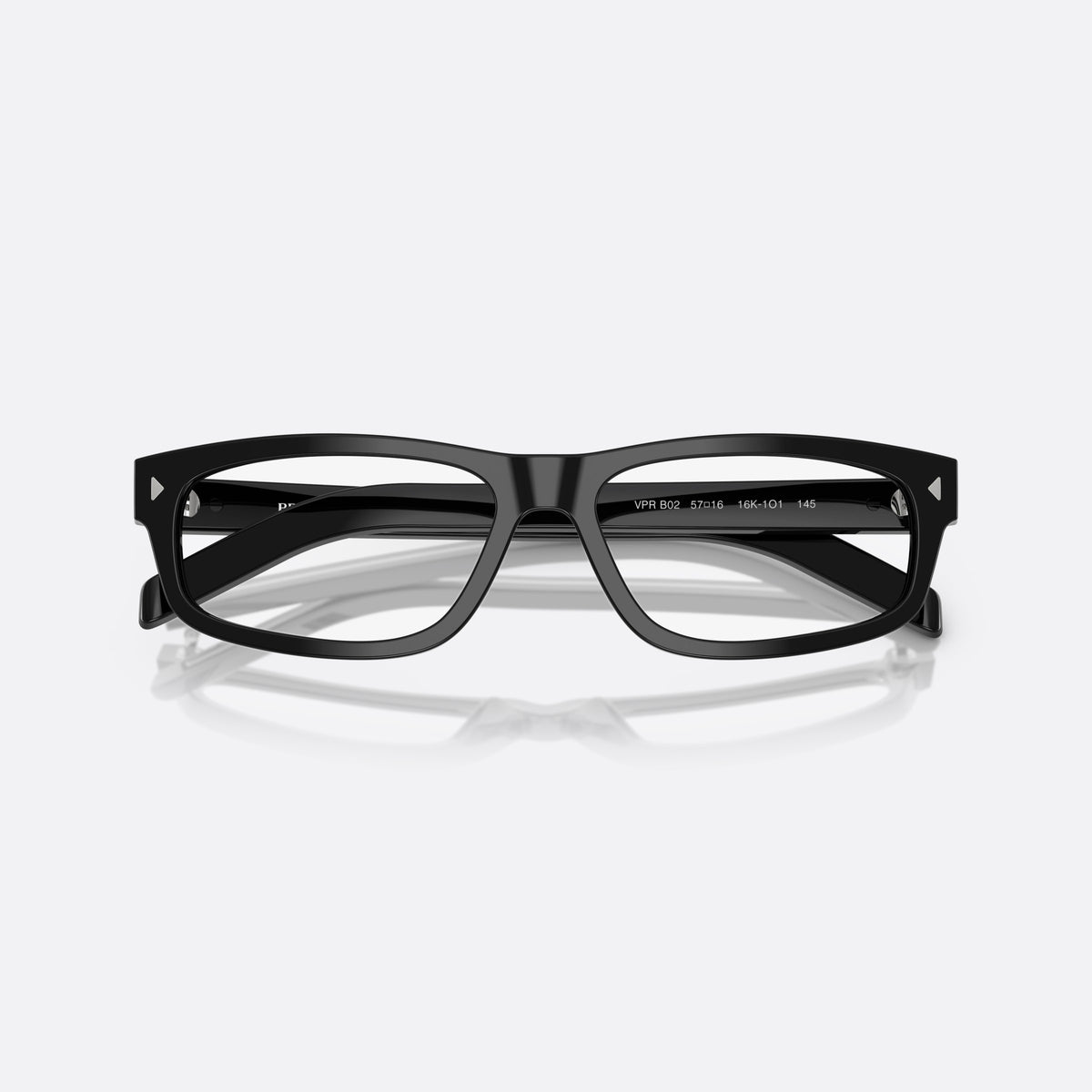 Prada PR B02V 16K1O1 eyeglasses, black squared frame for men, plain saddle bridge, brand lettering on temples, folded