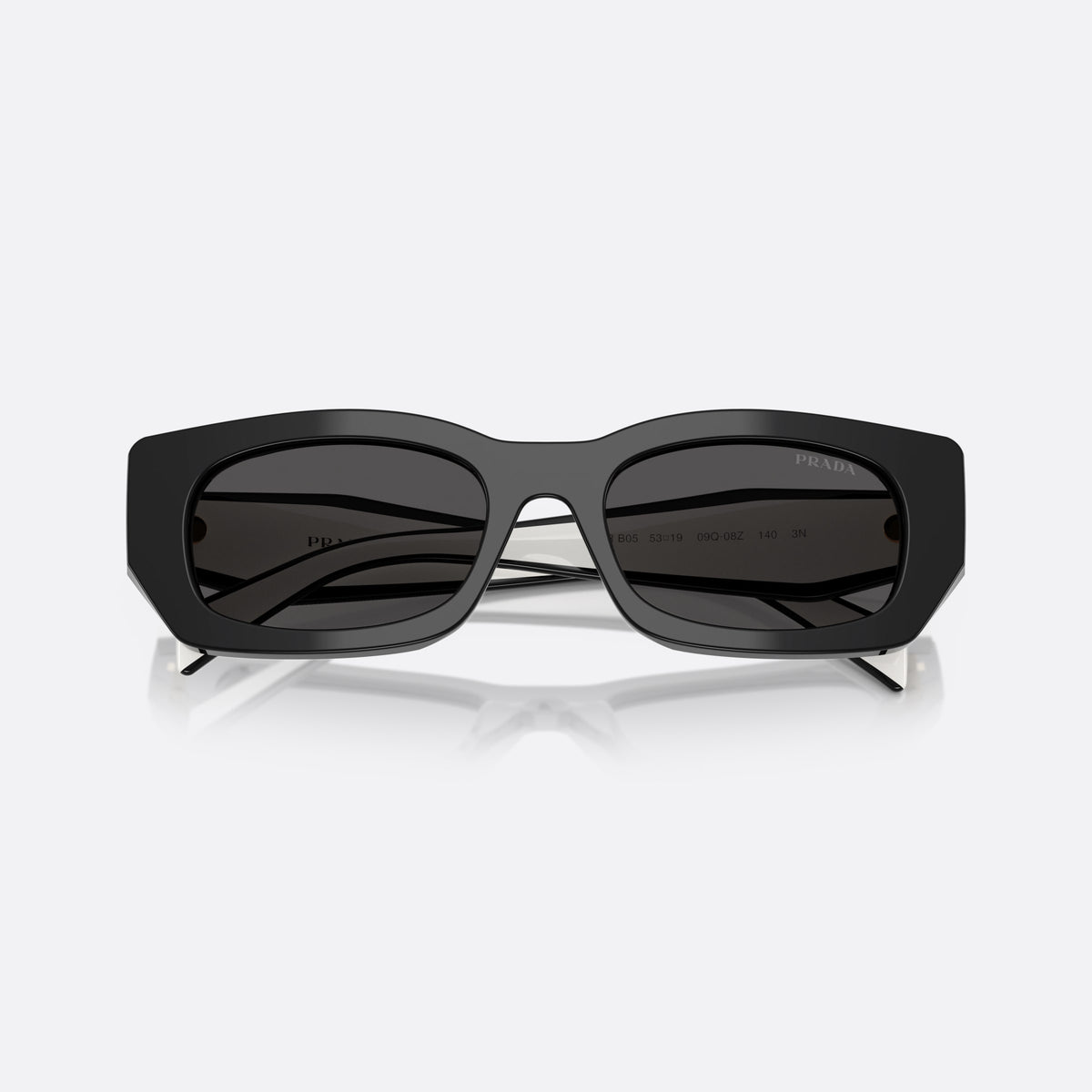 Prada PR B05S 09Q08Z BLGR sunglasses, black squared frame for women, plain bridge, brand lettering on temples, two-tone temples, folded
