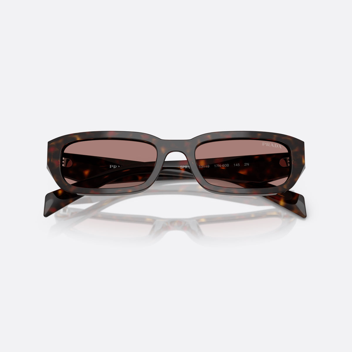 Prada PR B06S 17N60B TOBW sunglasses, brown rectangle frame for women, plain bridge, brand logo plaque on temple, folded
