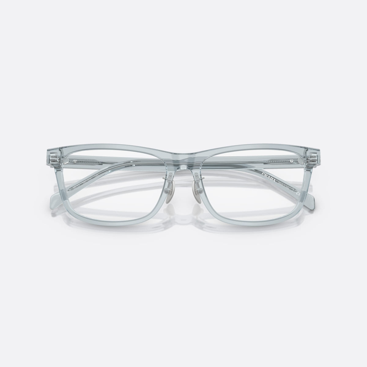 Prada PR B08VD 19T1O1 eyeglasses, blue visor frame for men, plain integrated bridge, brand lettering on temples, folded