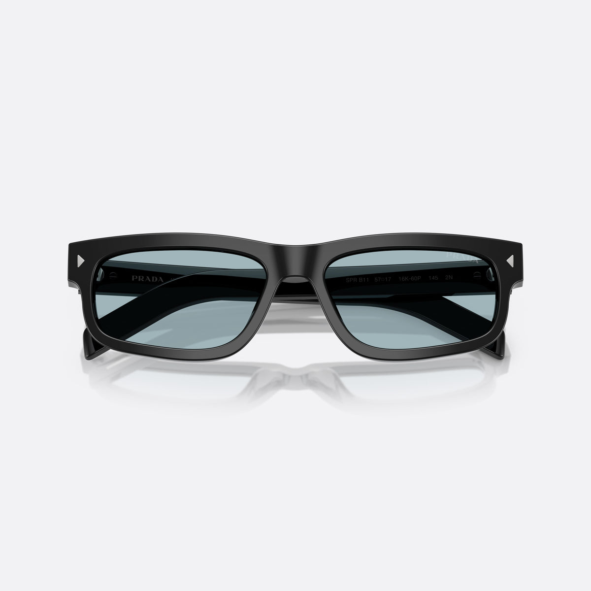 Prada PR B11S 16K60P sunglasses, black rectangle frame for men, plain bridge, brand lettering on temples, full-rim frame, folded