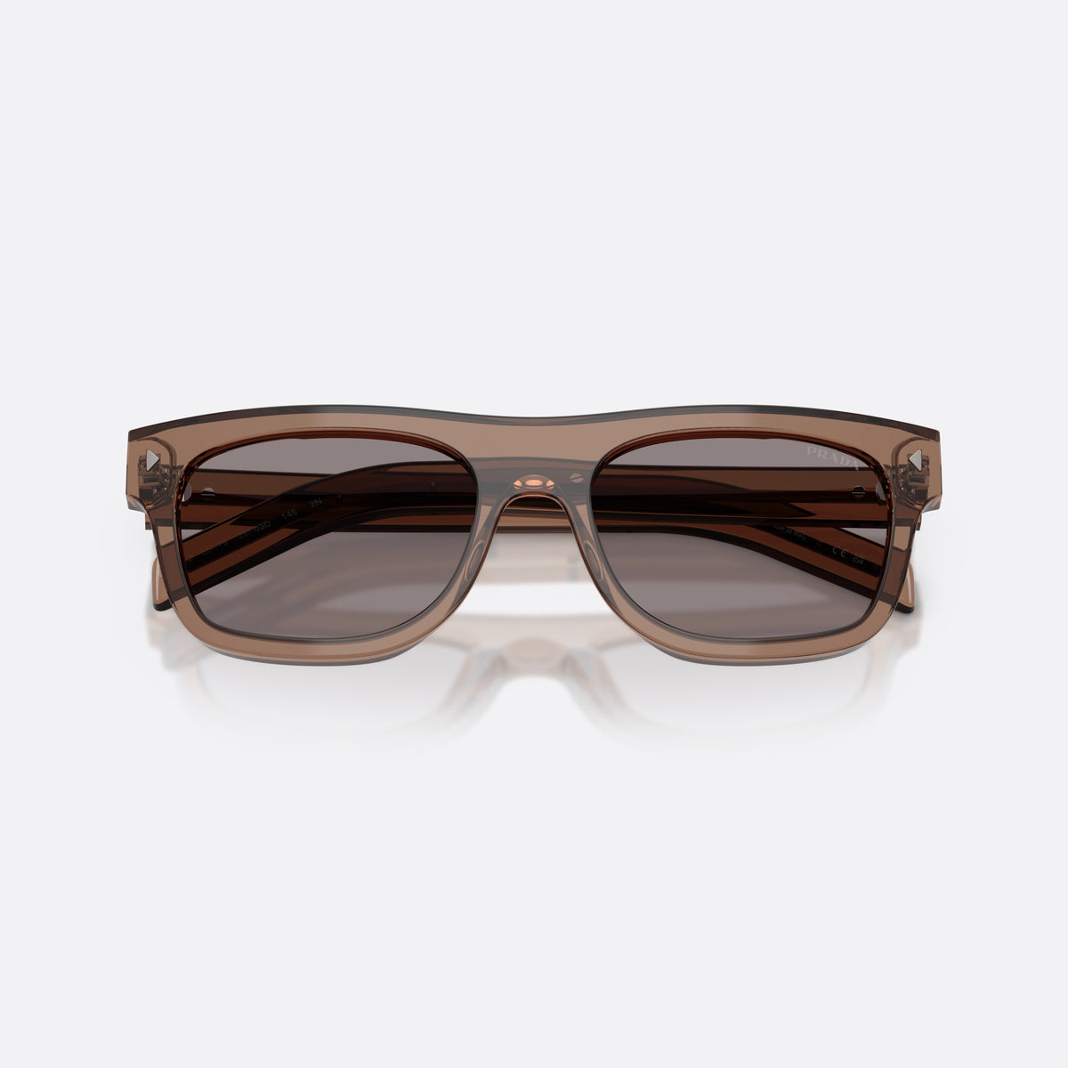 Prada PR B12S 28I03D sunglasses, clear pillow frame for men, plain bridge, brand lettering on temples, full-rim frame, folded