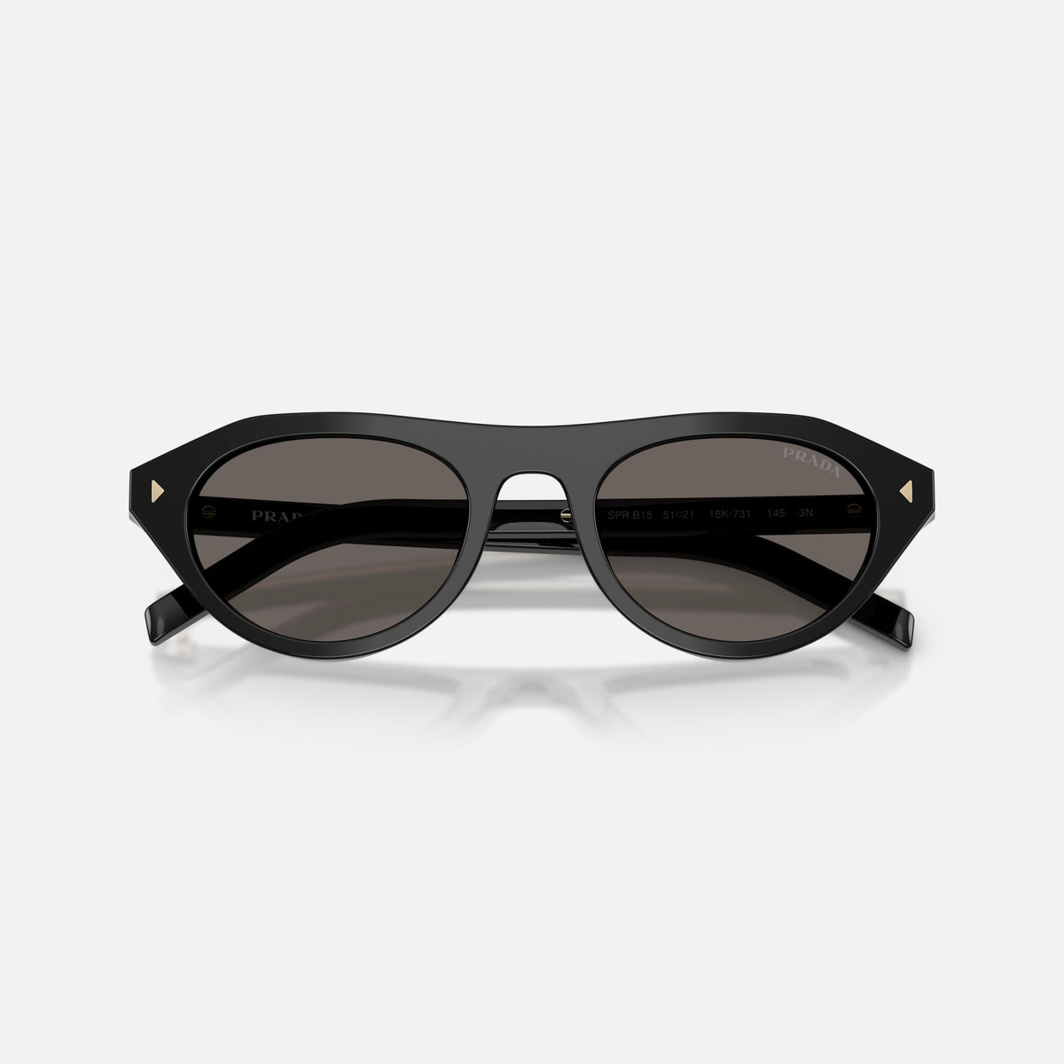Prada PR B15S 16K731 sunglasses, black irregular frame for women, plain acetate bridge, brand lettering on temples, folded