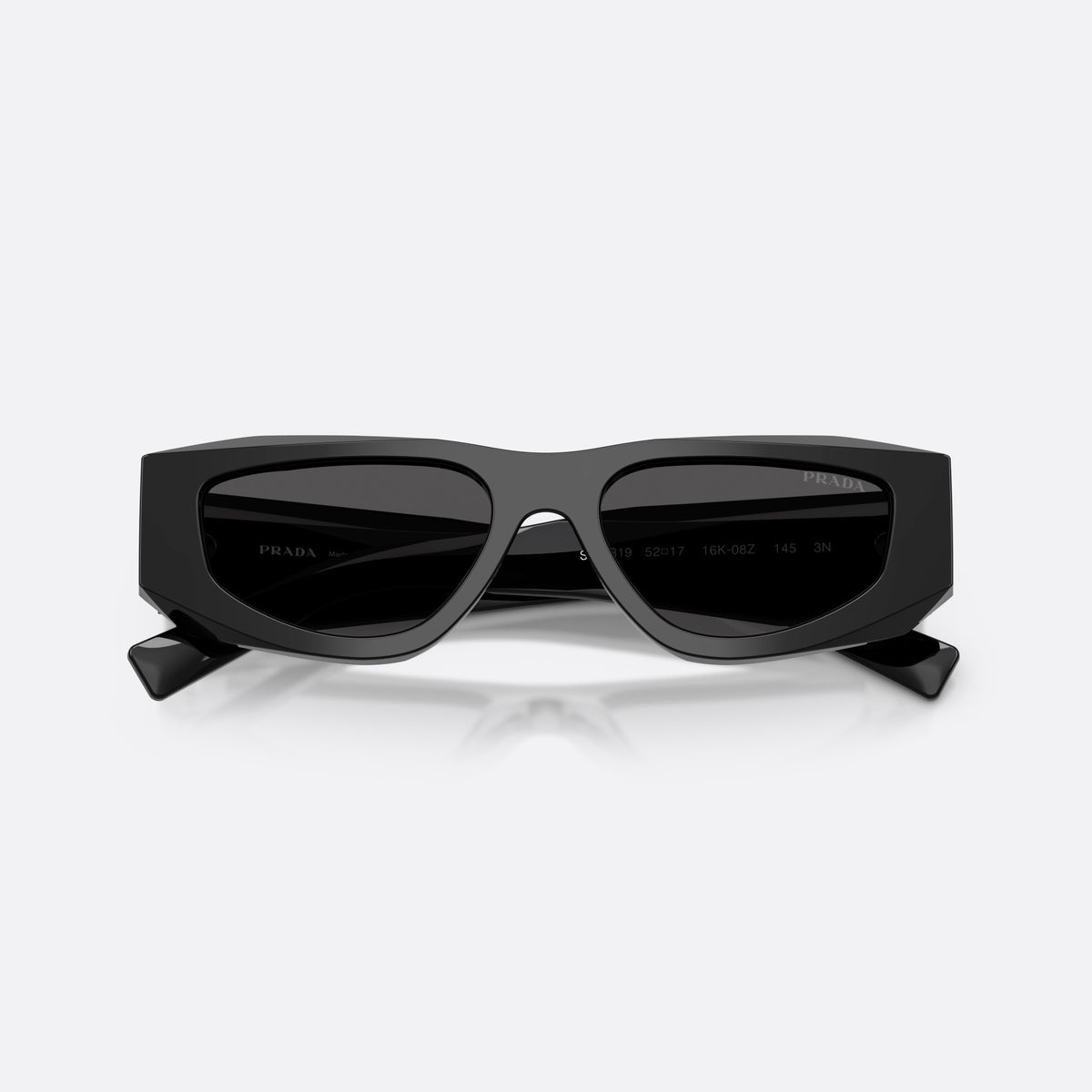 Prada PR B19S 16K08Z sunglasses, black pillow frame for men, plain bridge, integrated into frame, full-rim thick frame, folded