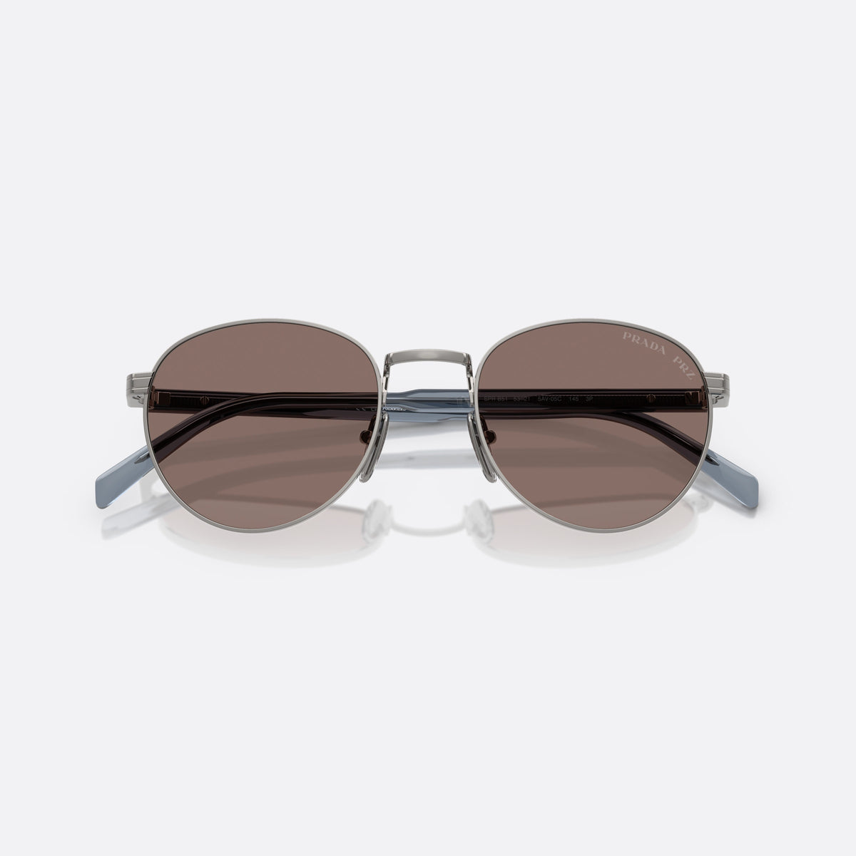 Prada PR B51S 5AV05C PBRD sunglasses, black oval frame for men, plain metal bridge, brand lettering on temples, folded