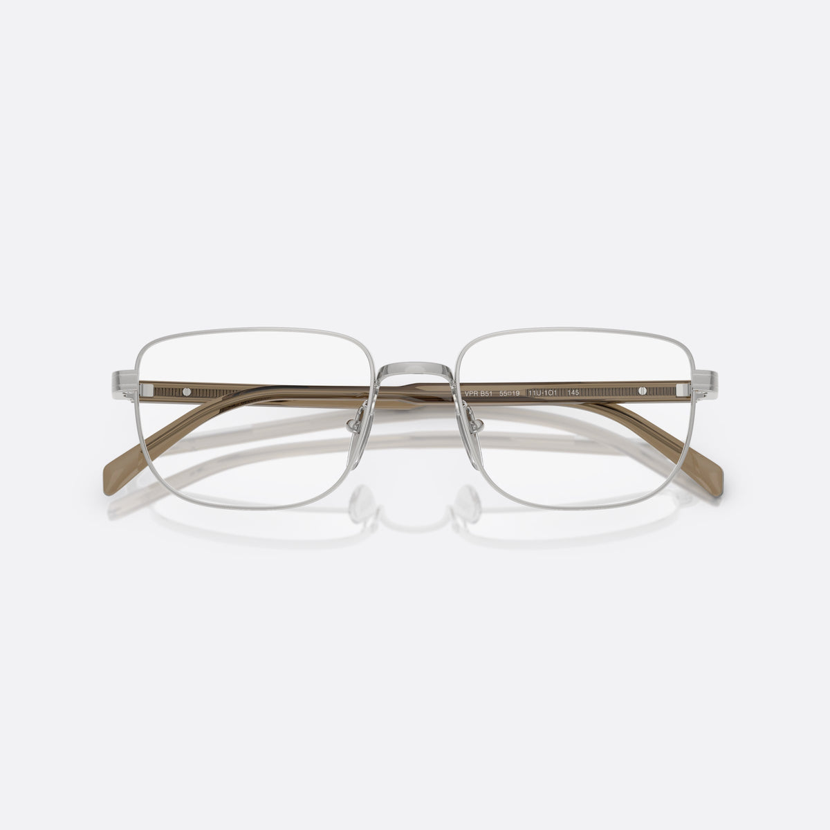 Prada PR B51V 11U1O1 eyeglasses, silver geometric frame for men, plain metal bridge, brand lettering on the temples, folded