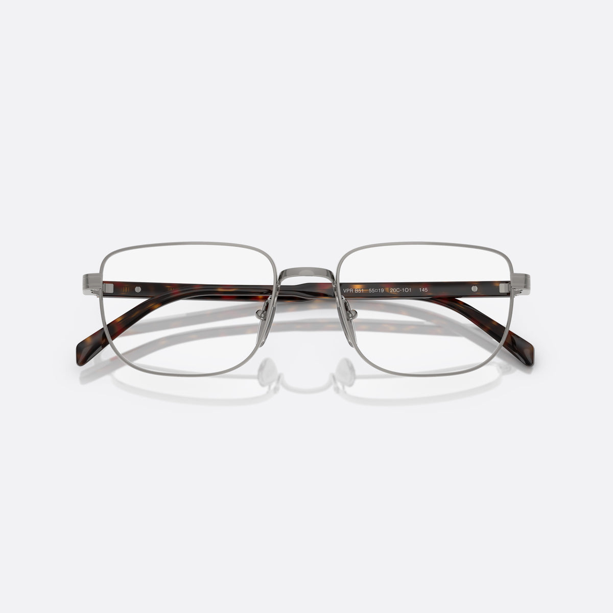 Prada PR B51V 20C1O1 eyeglasses, silver geometric frame for men, plain metal bridge, brand lettering on temples, folded