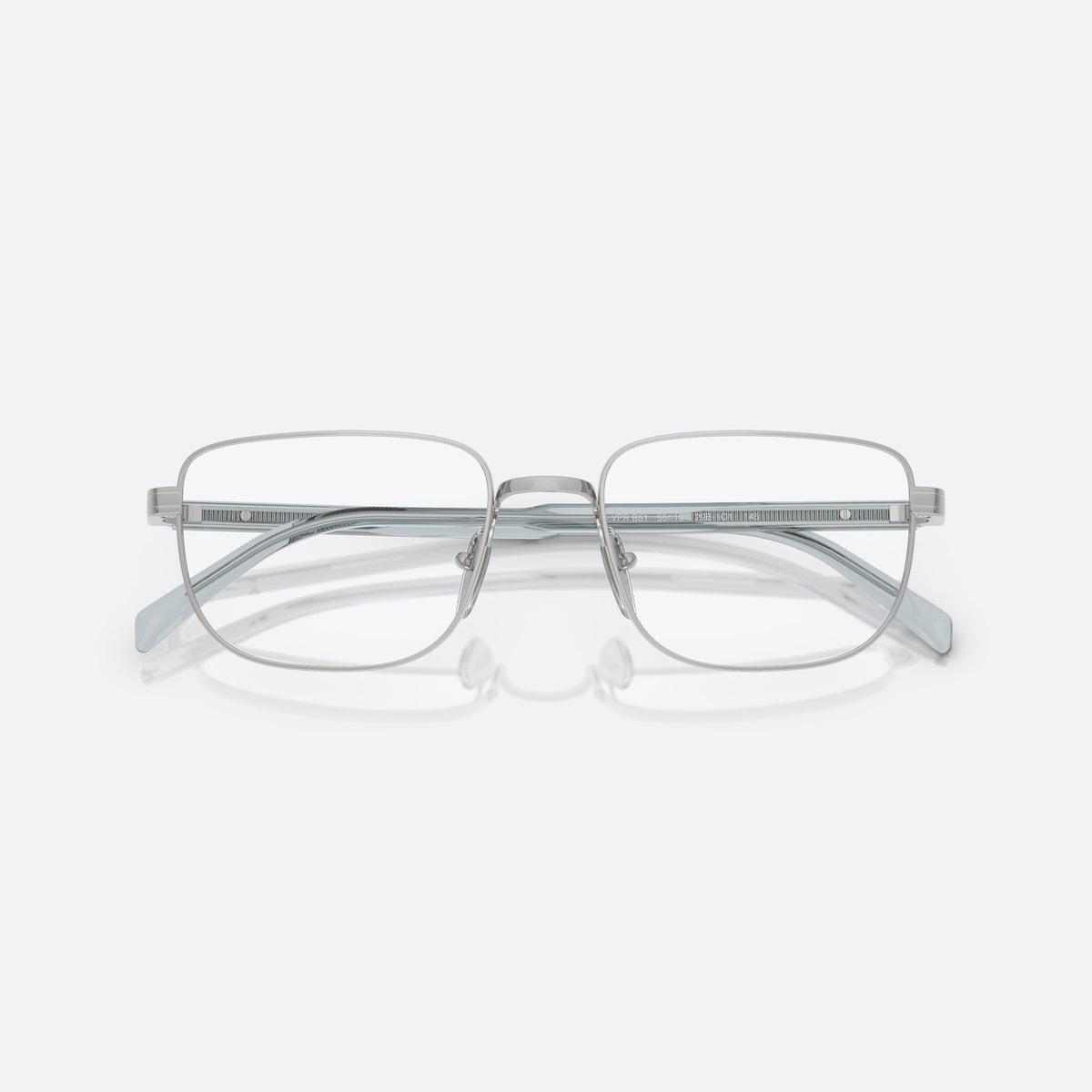 Prada PR B51V 29B1O1 eyeglasses, silver geometric frame for men, plain metal bridge, brand lettering on temples, folded