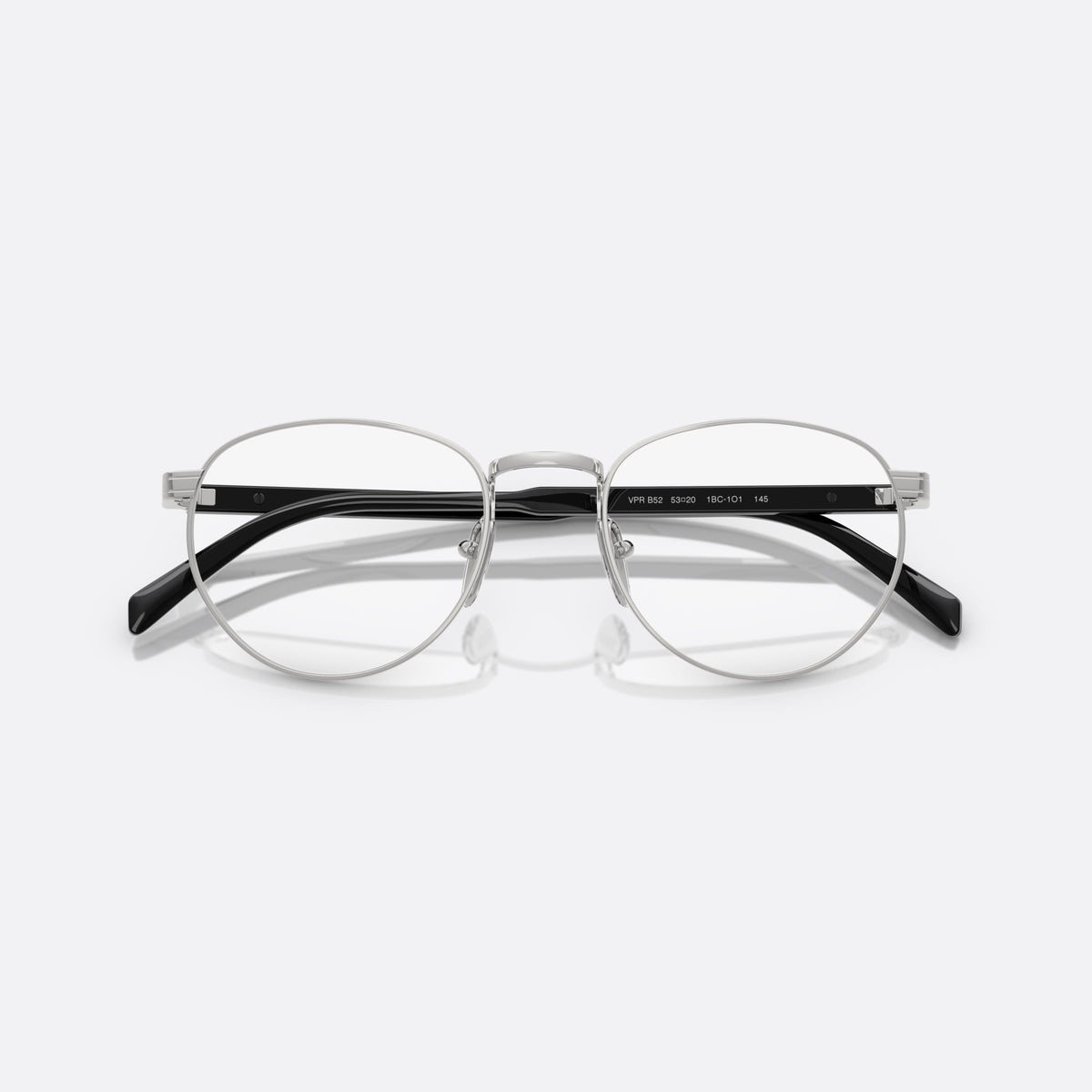 Prada PR B52V 1BC1O1 eyeglasses, silver visor frame for men, plain metal bridge, brand lettering on temples, folded