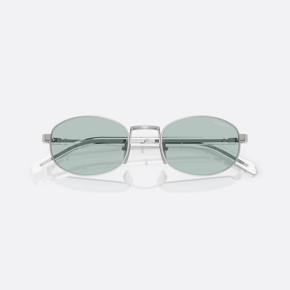 Prada PR B53S 1BC40N sunglasses, silver oval frame for women, plain metal bridge, brand lettering on temples, folded