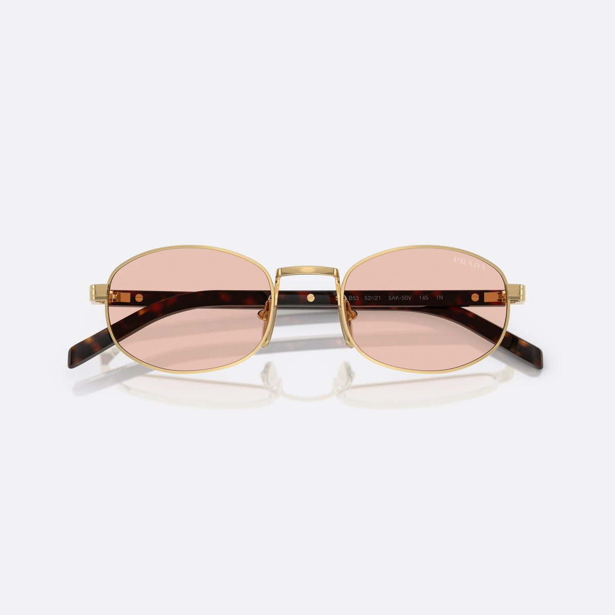 Ochelari de soare Prada PR B53S 5AK50V, ovali auriu, pentru femei, punte metalică simplă, literele brandului pe brațe, cu brațele pliate